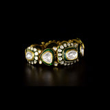 Royal Polki Flexible Bracelet A luxurious flexible bracelet showcasing oversized diamond polki, accented with shimmering polki details and rich green enamel for timeless royal elegance and charm.(KMBR0153)
