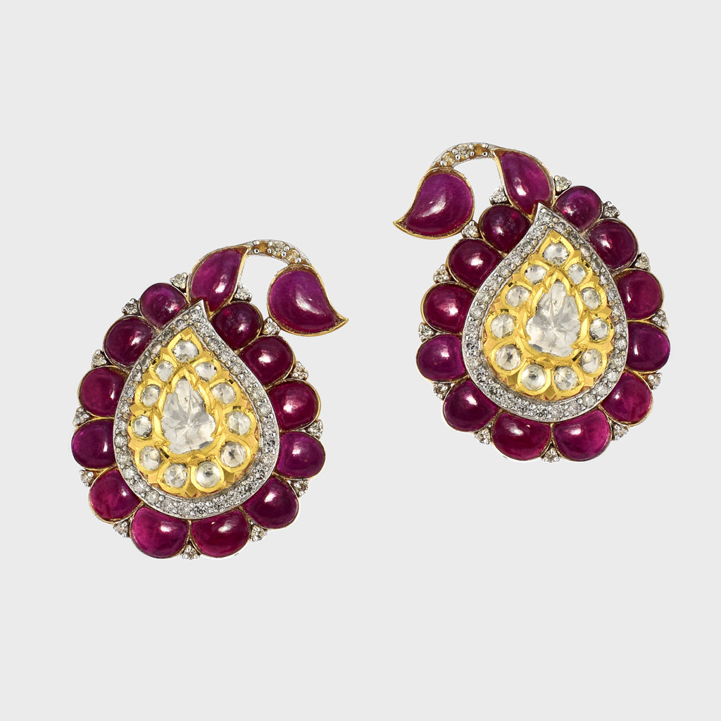 Discover the perfect fusion of elegance and luxury with our exquisite tops, featuring uncut diamonds, brilliant diamond rounds, and vibrant ruby cabs.(KME2238)