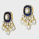 Our exquisite earrings, adorned with dazzling Diamond Polki, Diamond Rounds, and vibrant blue stones, accentuated by delicate pearl hangings. Embrace the fusion of elegance and sophistication (KME2255)