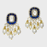 Our exquisite earrings, adorned with dazzling Diamond Polki, Diamond Rounds, and vibrant blue stones, accentuated by delicate pearl hangings. Embrace the fusion of elegance and sophistication (KME2255)