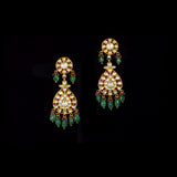 Royal Polki Bridal Necklace Set A magnificent diamond polki necklace featuring ruby detailing, emerald bead hangings, and matching statement earrings—crafted for timeless bridal elegance with regal heritage appeal.(KMNE3643)