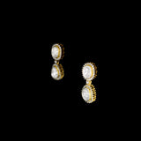 Elegant dangling earrings featuring a bold diamond Polki at the center, beautifully surrounded by sparkling round diamonds. A timeless design that adds graceful charm and brilliance to any special occasion.(KME2441)