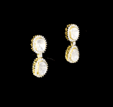 Elegant dangling earrings featuring a bold diamond Polki at the center, beautifully surrounded by sparkling round diamonds. A timeless design that adds graceful charm and brilliance to any special occasion.(KME2441)