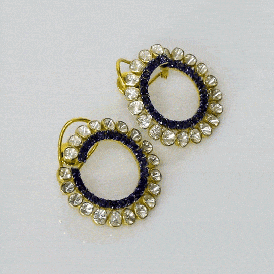 Modern fusion-style earrings featuring sparkling Polki diamonds and rich blue sapphires, crafted to add elegance, charm, and timeless beauty to every look.(KME2485)