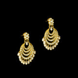 Elegant white chandbali earrings with sparkling Polki diamonds and pearl drops, designed to bring graceful traditional charm and timeless beauty to every occasion.(KME2522)