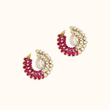 A captivating fusion design showcasing luminous Diamond Polki, sparkling diamonds, and vivid rubies, creating statement earrings perfect for every special occasion.(KME2525)
