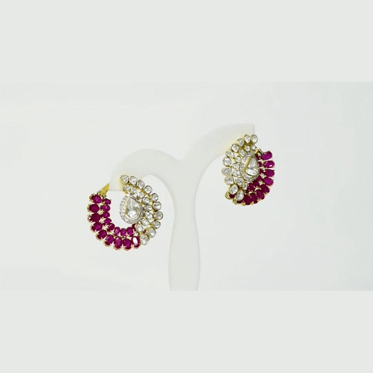 A captivating fusion design showcasing luminous Diamond Polki, sparkling diamonds, and vivid rubies, creating statement earrings perfect for every special occasion.(KME2525)