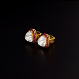 Fusion Diamond Polki & Ruby Tops A bold Diamond Polki centre embraced by vibrant ruby accents, these fusion-style tops beautifully combine timeless heritage with contemporary elegance for every occasion.(KME2533)