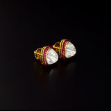 Fusion Diamond Polki & Ruby Tops A bold Diamond Polki centre embraced by vibrant ruby accents, these fusion-style tops beautifully combine timeless heritage with contemporary elegance for every occasion.(KME2533)