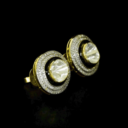 Diamond Polki Statement Tops Bold Diamond Polki tops framed with brilliant round diamonds, crafted to make every look effortlessly refined and distinctive.(KME2545)
