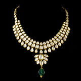 Radiate timeless elegance with our exquisite necklace set, featuring shimmering diamond polki complemented by the enchanting allure of emerald maniyas.(KMNE2892)