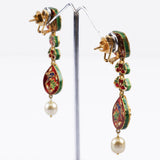 Long necklace and earring pair with red enamelled work with Diamond polki and pearls  KMNE2960