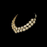 This grand fusion-style necklace features a Big diamond Polki at the center, surrounded by shimmering round diamonds. A striking design that blends traditional elegance with modern luxury for special occasions.(KMNE3296)