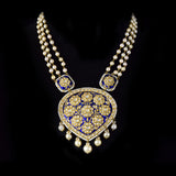 Elegant long necklace featuring rich blue enamel detailing, adorned with gold and uncut diamond polki floral motifs, gracefully strung with lustrous pearls in gold wire, creating a timeless blend of tradition and sophistication. (KMNE3371)