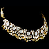 Indulge in the epitome of fusion elegance with our captivating necklace. Featuring a harmonious blend of dazzling diamonds, raw uncut diamonds, and delicate pearls, it's a testament to modern sophistication with a touch of timeless charm.(KMNE3385)