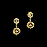 Radiate regal charm with this stunning red enameled necklace and earring set, intricately crafted with uncut diamonds. A perfect blend of heritage and glamour for festive occasions and bridal elegance. (KMNE3553)