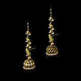 This white choker necklace and jhoomki pair is beautifully crafted with uncut diamonds, and strung with rubies and pearls. A perfect blend of elegance and tradition for weddings and festive occasions.(KMNE3585)