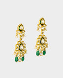 An elegant necklace and earring set featuring diamond polki framed by a vivid green circle, strung with emerald maniya and pearls. Blending heritage craftsmanship with refined luxury, it’s perfect for graceful, modern celebrations. (KMNE3588)