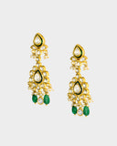 An elegant necklace and earring set featuring diamond polki framed by a vivid green circle, strung with emerald maniya and pearls. Blending heritage craftsmanship with refined luxury, it’s perfect for graceful, modern celebrations. (KMNE3588)