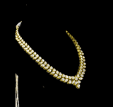 Elegant and timeless, this white two-line connected long necklace and earring pair features dazzling uncut diamonds. Perfect for adding grace and sparkle to weddings, festive events, or special celebrations.(KMNE3590) + (KME2373)