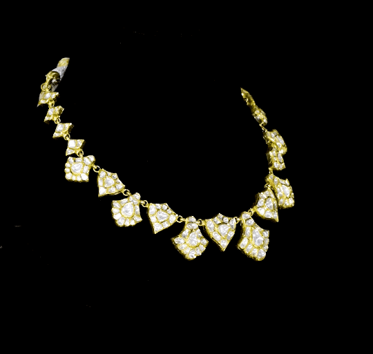 "Elegant diamond uncut polki necklace set with intricate handcrafted design, featuring matching earrings – perfect for weddings and festive occasions. Style code: KMNE3591."
