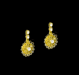 Delicate and dazzling, this necklace and earring pair features uncut diamond polki in an elegant open setting, crafted in a graceful floral design. A perfect blend of timeless beauty and fine craftsmanship for special occasions and celebrations.(KMNE3596)