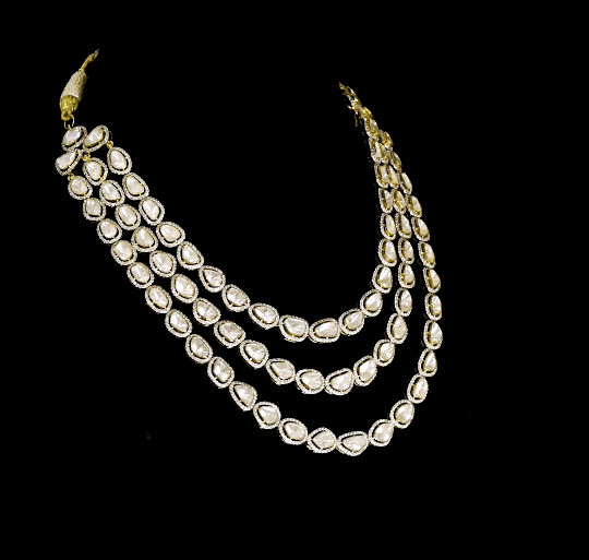 Discover versatile elegance with this fusion-style 3-line necklace and earring pair, featuring dazzling uncut and round diamonds. Each line is detachable, allowing you to wear it three unique ways—perfect for every occasion and mood.(KMNE3606)