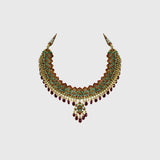 Beautiful red enameled flower design necklace and earrings set with sparkling uncut diamond polki, strung with ruby maniya and pearls. Perfect to add a touch of tradition and elegance to any special occasion.(KMNE3608)