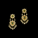 Make a majestic statement with this grand necklace set, featuring uncut diamond Polki, a striking emerald centerpiece, rich red stones, and delicate pearls in the funghar. A masterpiece of regal elegance.(KMNE3616)