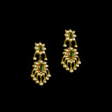 Make a majestic statement with this grand necklace set, featuring uncut diamond Polki, a striking emerald centerpiece, rich red stones, and delicate pearls in the funghar. A masterpiece of regal elegance.(KMNE3616)