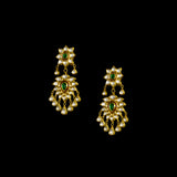 Make a majestic statement with this grand necklace set, featuring uncut diamond Polki, a striking emerald centerpiece, rich red stones, and delicate pearls in the funghar. A masterpiece of regal elegance.(KMNE3616)