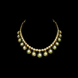 Elegance redefined with this stunning necklace, featuring uncut diamond Polki and graceful pear-shaped drops. A timeless design that captures the essence of luxury, perfect for weddings, festivities.(KMNE3617)