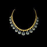 Elegance redefined with this stunning necklace, featuring uncut diamond Polki and graceful pear-shaped drops. A timeless design that captures the essence of luxury, perfect for weddings, festivities.(KMNE3617)