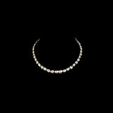 Understated elegance shines through this single-line necklace and earring pair, featuring uncut diamond Polki. A graceful blend of tradition and simplicity—perfect for intimate celebrations and timeless everyday sophistication.(KMNE3620)