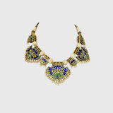 Elevate your style with this exquisite blue Meena Pankhi necklace and earring set, featuring uncut diamonds and delicate pearls. A timeless blend of traditional artistry and elegance, perfect for festive and bridal occasions.(KMNE3625) + (KME2445)