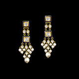 A regal blue enamelled choker set in gold, showcasing bold oversized polki diamonds framed with intricate detailing, finished with cascading South Sea pearl fringes and perfectly matched statement earrings for timeless grandeur. (KMNE3720)