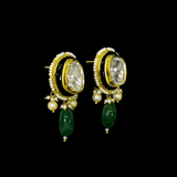 A majestic choker showcasing large polki diamonds set in striking green-enamelled gold, layered with intricate detailing, finished with cascading emerald drops and pearl fringes—opulent, bold, and exquisitely regal. (KMNE3724)
