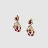 Ruby & Diamond Polki Three-Line Necklace Set Grace your celebrations with this elegant three-line necklace and earrings, featuring vibrant rubies, shimmering diamond polki, and timeless craftsmanship for sophisticated traditional luxury.(KMNE3751)