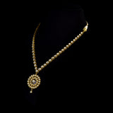 Single-Line Diamond Polki Necklace An elegant single-line diamond polki necklace featuring a beautifully crafted statement pendant, blending timeless artistry with graceful sophistication for every special occasion.(KMNE3755)