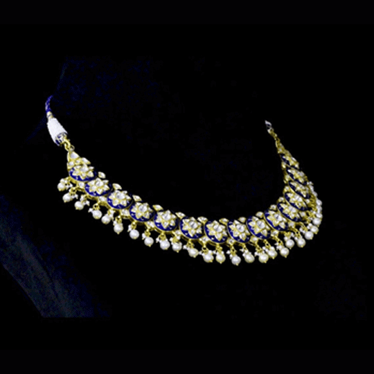Traditional blue enamelled necklace adorned with sparkling diamond polki motifs and delicate pearl hangings, blending timeless artistry with graceful elegance for every special occasion.(KMNE3762)