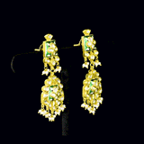 Green Enamelled Diamond Polki Necklace Set Traditional green enamelled necklace set adorned with sparkling diamond polki and delicate pearl hangings, paired with matching earrings for timeless elegance and festive charm.(KMNE3766)
