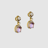 Fusion Diamond Polki Kunzite Necklace Set Elegant fusion necklace set featuring diamond polki, radiant round diamonds, vibrant kunzite gemstones, and pearl-accented chain, paired with matching earrings for contemporary sophistication.(KMNE3768)