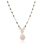 Grace your celebrations with this exquisite Diamond Polki necklace and earrings, accented with brilliant diamonds, emerald maniya, and delicate pearls.(KMNE3792)