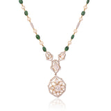 Grace your celebrations with this exquisite Diamond Polki necklace and earrings, accented with brilliant diamonds, emerald maniya, and delicate pearls.(KMNE3792)