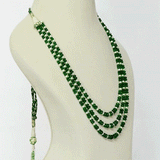 Three graceful strands of vibrant emerald beads, accented with lustrous pearls, create a timeless necklace that embodies refined luxury and effortless sophistication.(KMPE1197)