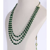 Three graceful strands of vibrant emerald beads, accented with lustrous pearls, create a timeless necklace that embodies refined luxury and effortless sophistication.(KMPE1197)