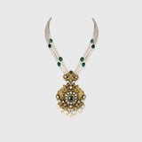 Discover refined elegance with this fusion-style pendant, showcasing uncut diamond Polki, round diamonds, and a central emerald. Strung with pearls and long emerald beads, it’s a striking blend of tradition and modern sophistication.(KMPE1327)