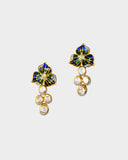 A pendant and earring set featuring diamond polki and round brilliant diamonds, accented with green and blue French enamel. Designed in a refined fusion style, it blends traditional artistry with a contemporary touch, ideal for festive occasions(KMPE1348)