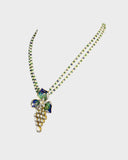 A pendant and earring set featuring diamond polki and round brilliant diamonds, accented with green and blue French enamel. Designed in a refined fusion style, it blends traditional artistry with a contemporary touch, ideal for festive occasions(KMPE1348)
