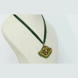 Royal Pankhi Pendant Set Traditional Pankhi pendant set adorned with vibrant red meenakari, sparkling diamond polki, and emerald bead stringing, paired with matching earrings for timeless regal elegance.(KMPE1360)